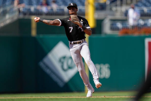 Tim Anderson of the Chicago White Sox throws out Jake Alu of the Washington Nationals at first base during the fourth inning at Nationals Park on...