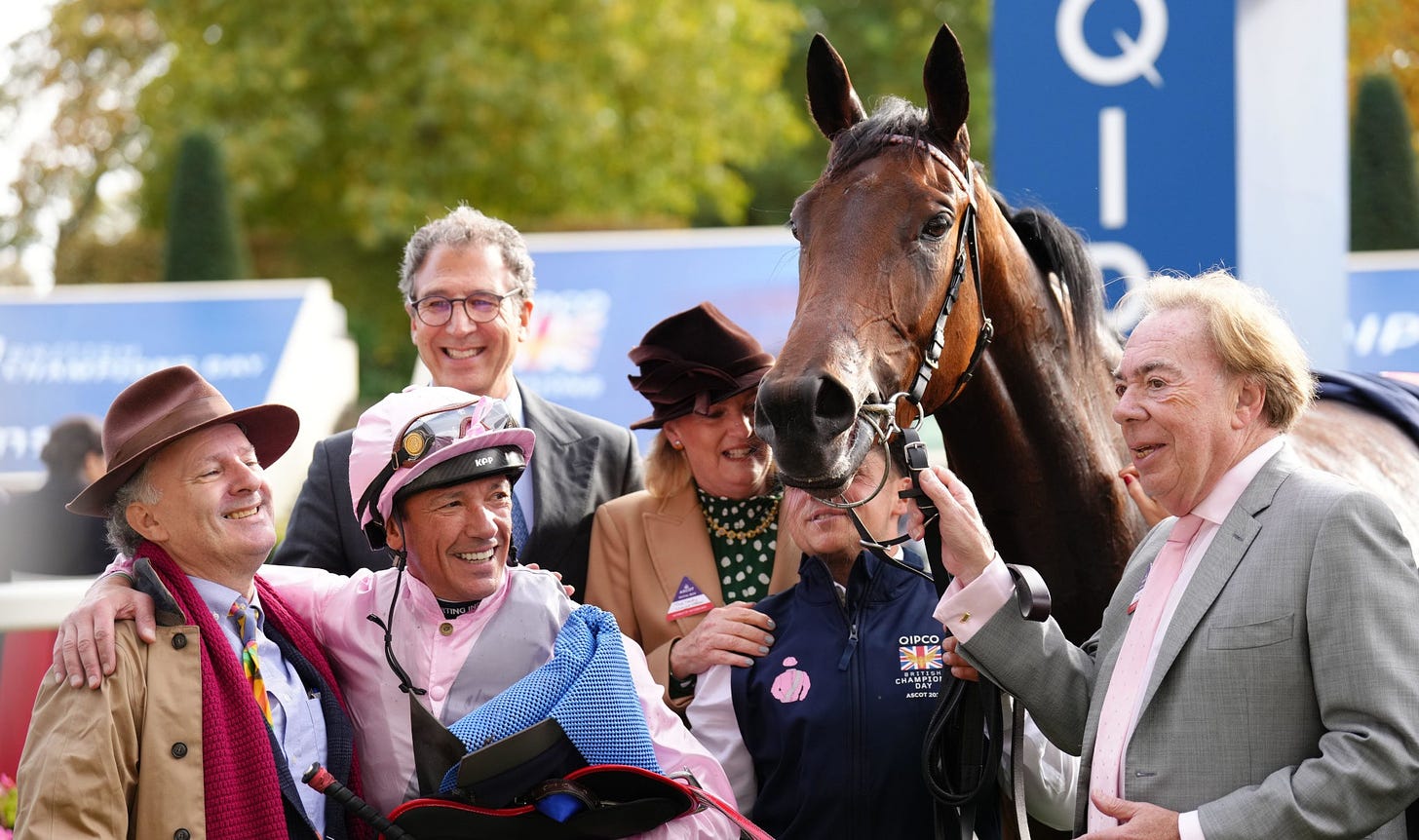 Frankie Dettori celebrates winning the Qipco British Champions Fillies & Mares Stakes on Emily Upjohn with connections and owner Andrew Lloyd Webber (right) during the QIPCO British Champions Day at Ascot Racecourse, Berkshire. Picture date: Saturday October 15, 2022.