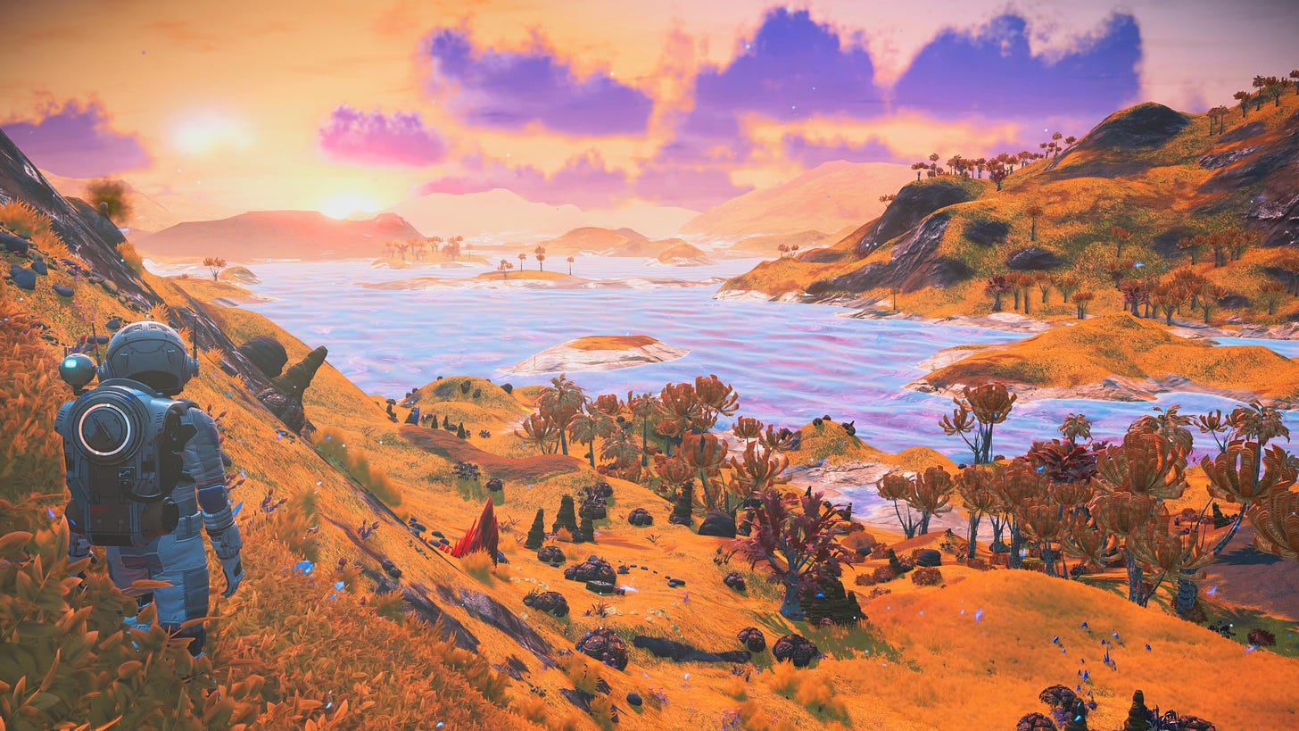 The customizable player character of No Man’s Sky overlooks a riverbank surrounded by colorful red and orange foliage. The sun is low in the sky and some clouds lilt overhead.