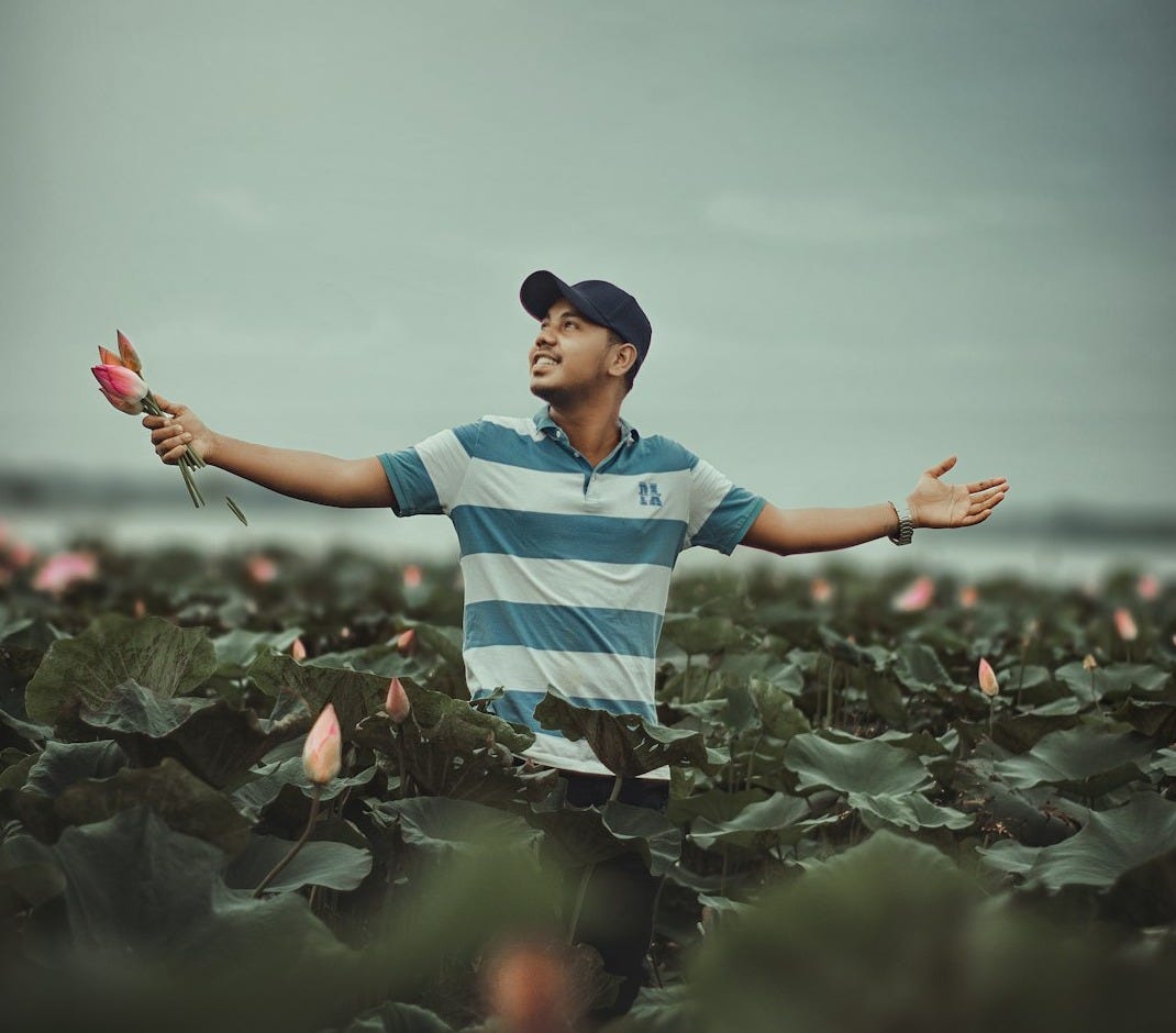 a man standing in a field