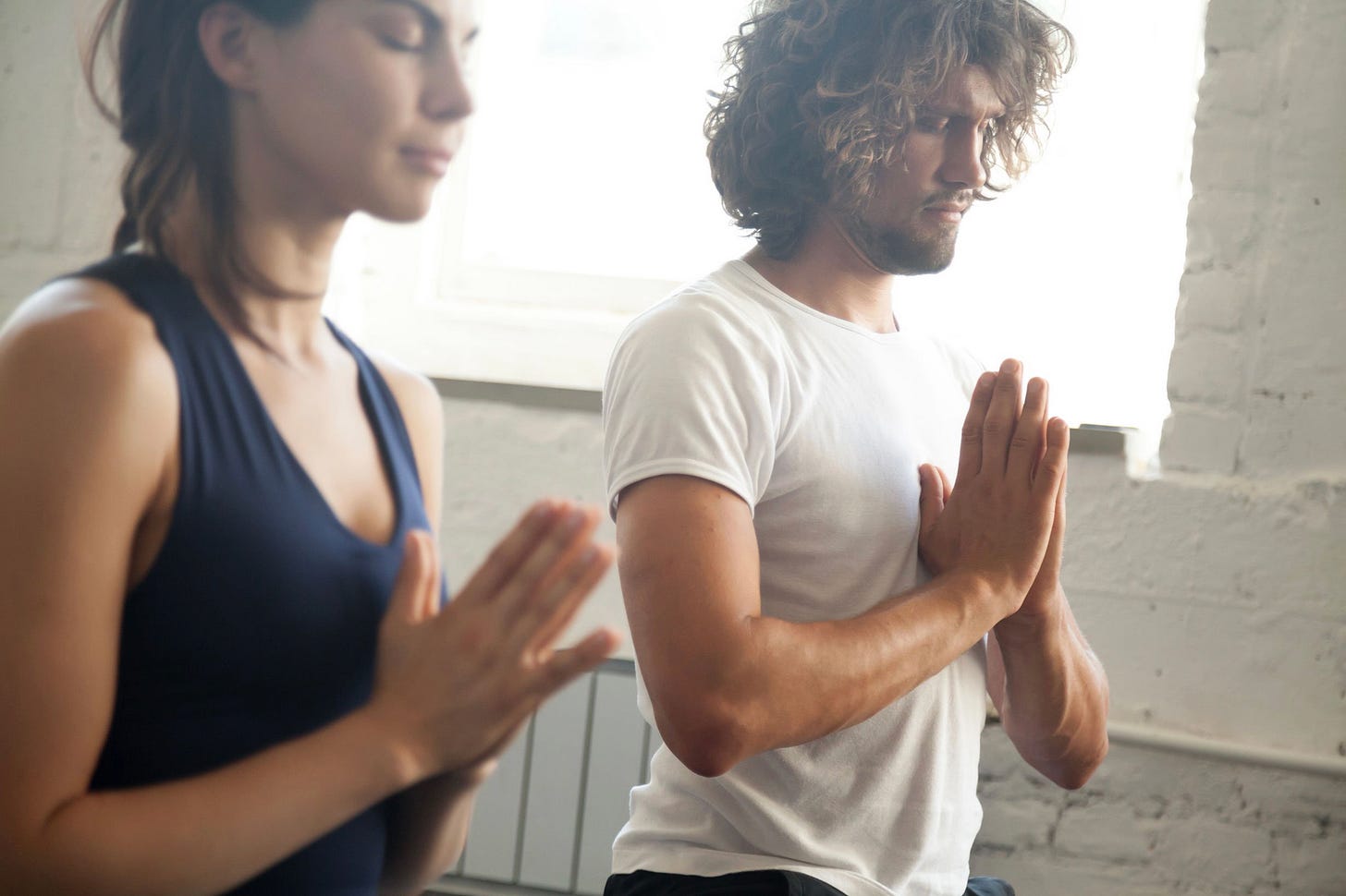 couple meditating together