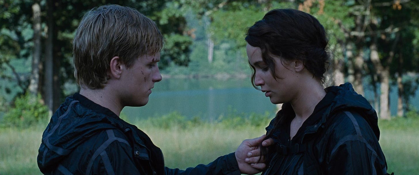 The Hunger Games (2012) - Peeta Mellark and Katniss Everdeen Photo  (36282093) - Fanpop