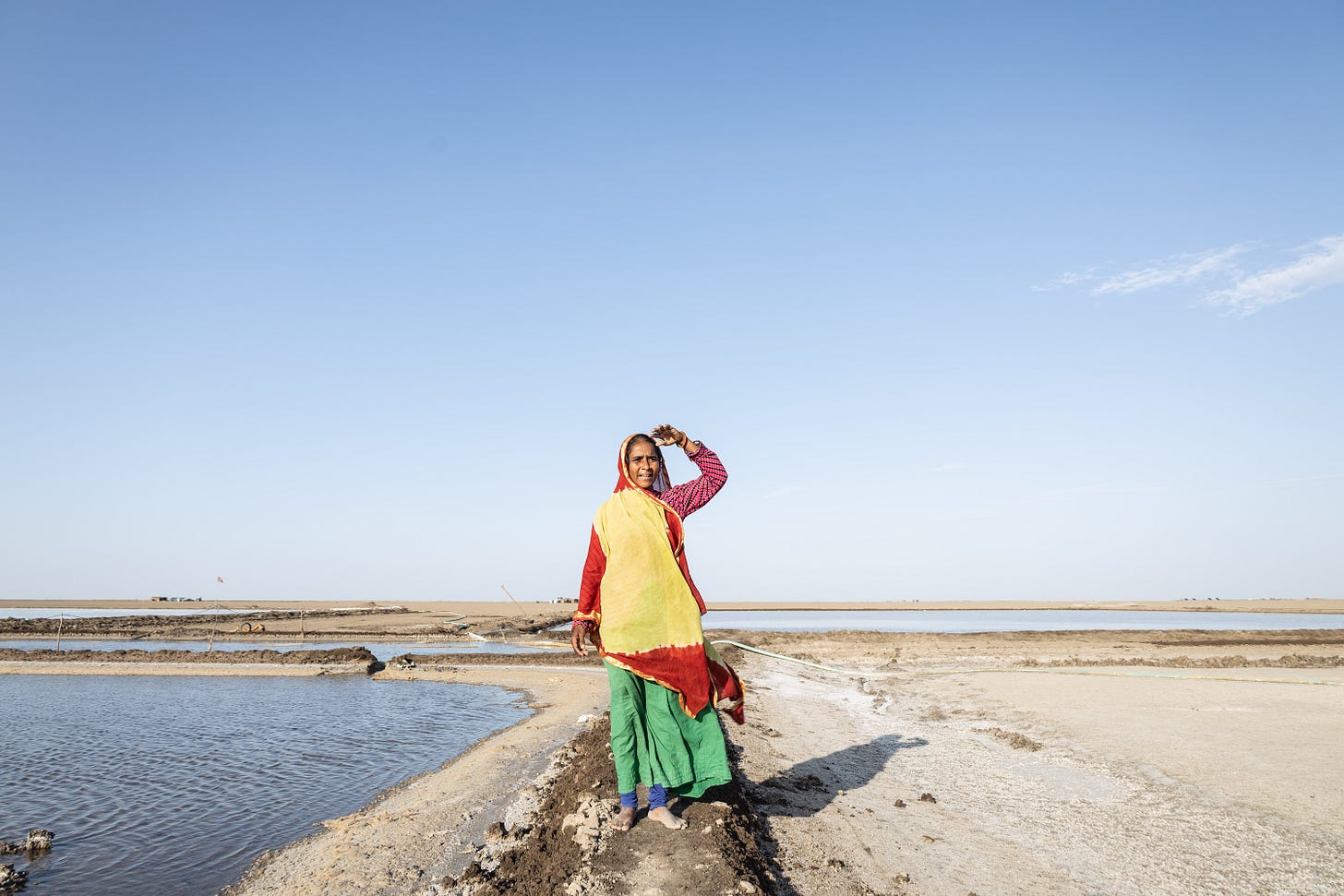 A salt pan worker. Extreme heat poses a serious health risk to outdoor workers. A salt pan worker. Extreme heat poses a serious health risk to outdoor workers.