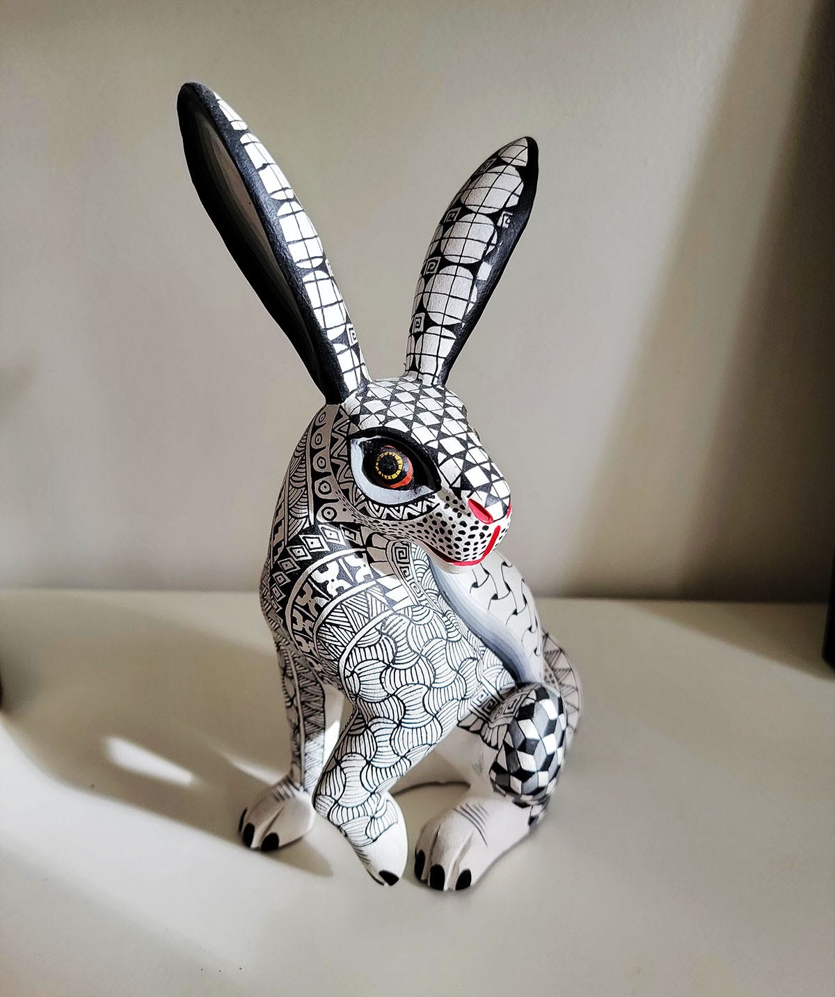 A white rabbit statue from Oaxaca. 