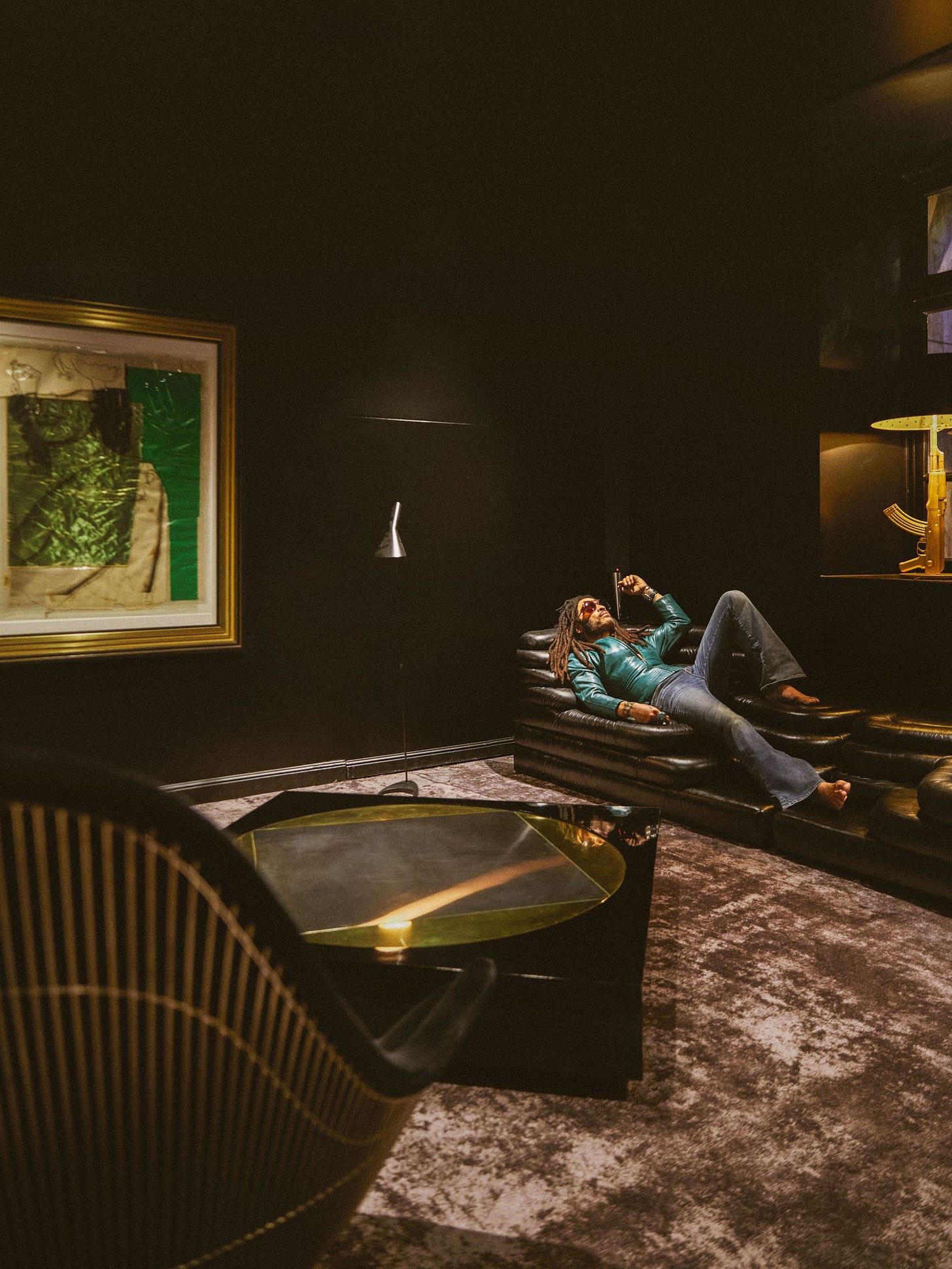 Image may contain Art Painting Person Architecture Building Furniture Indoors Living Room Room Lamp and Couch