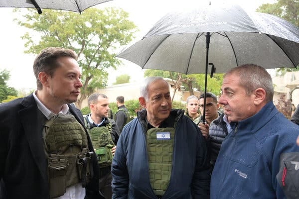 Musk, Netanyahu and another man are seen in conversation. 