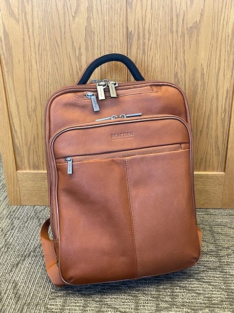 A brown leather backpack