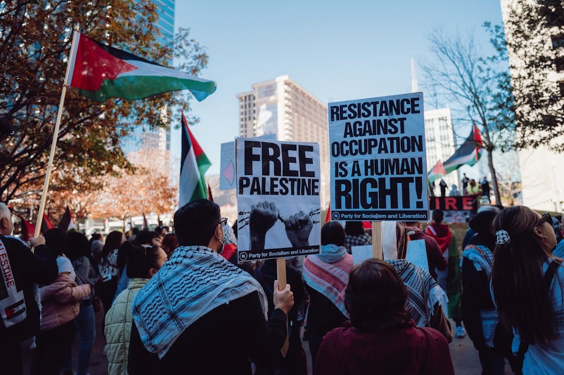 Free Protesters with Banners at Antiwar Protest Stock Photo