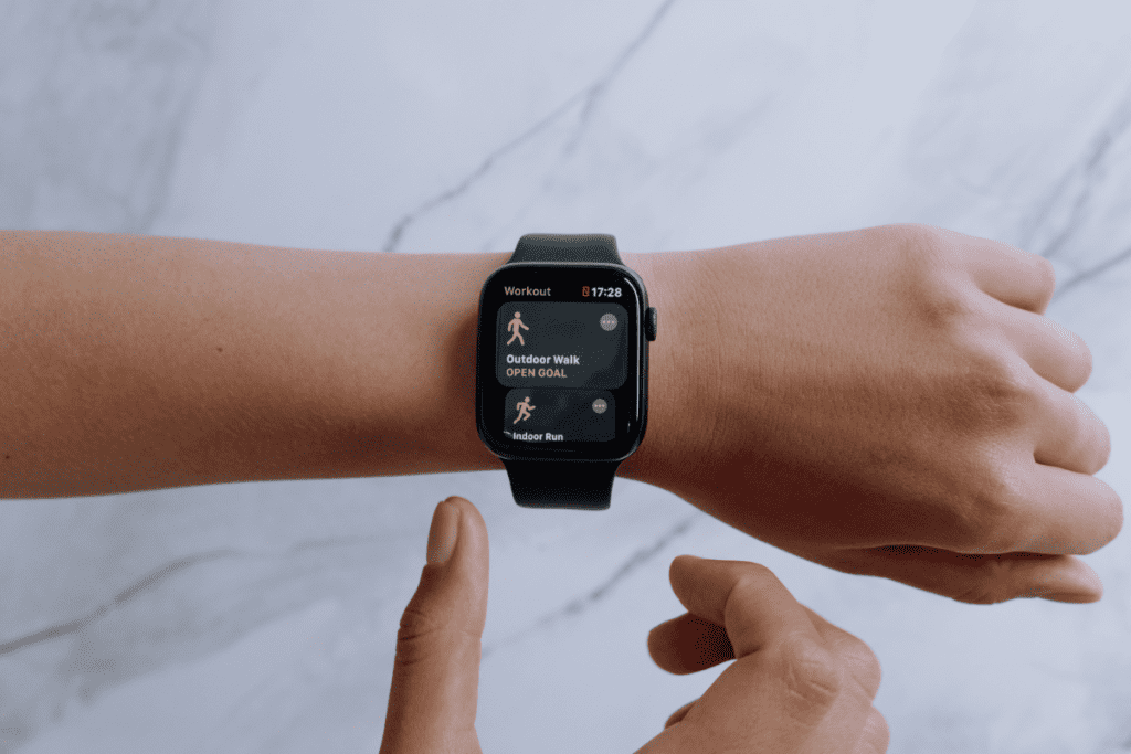 person wearing a black smartwatch for mindful productivity