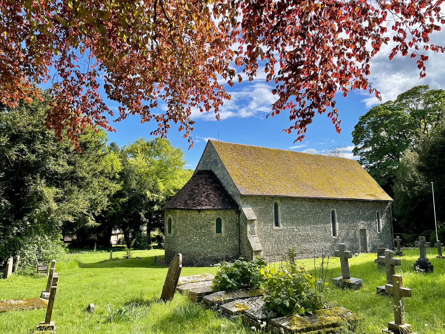 St Botolph Swyncombe, in the Chiltern Hills with graveyard in the foreground