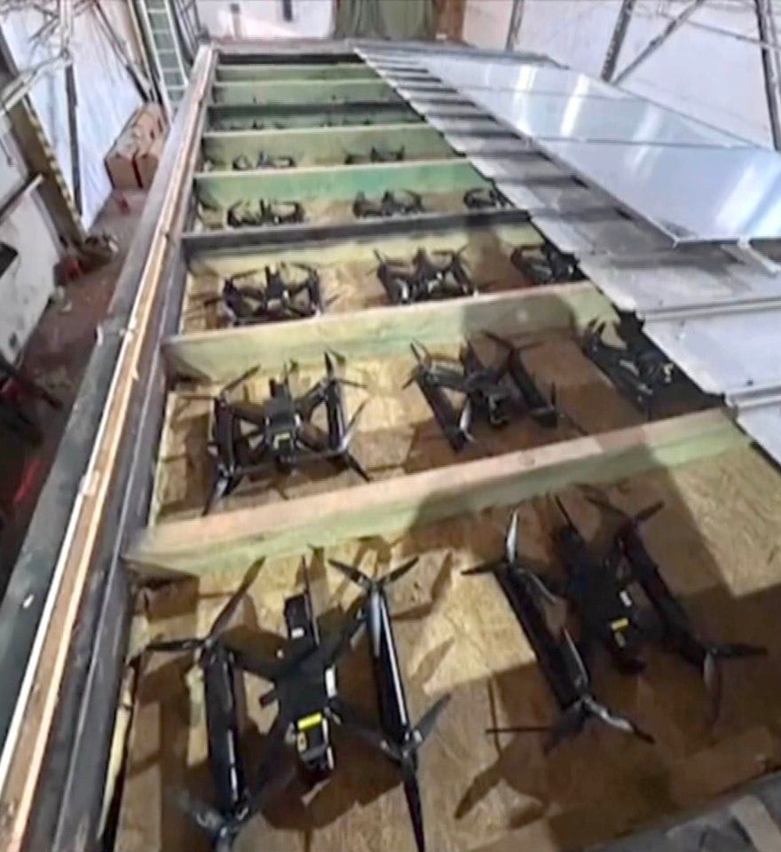Multiple drones in transport crates.