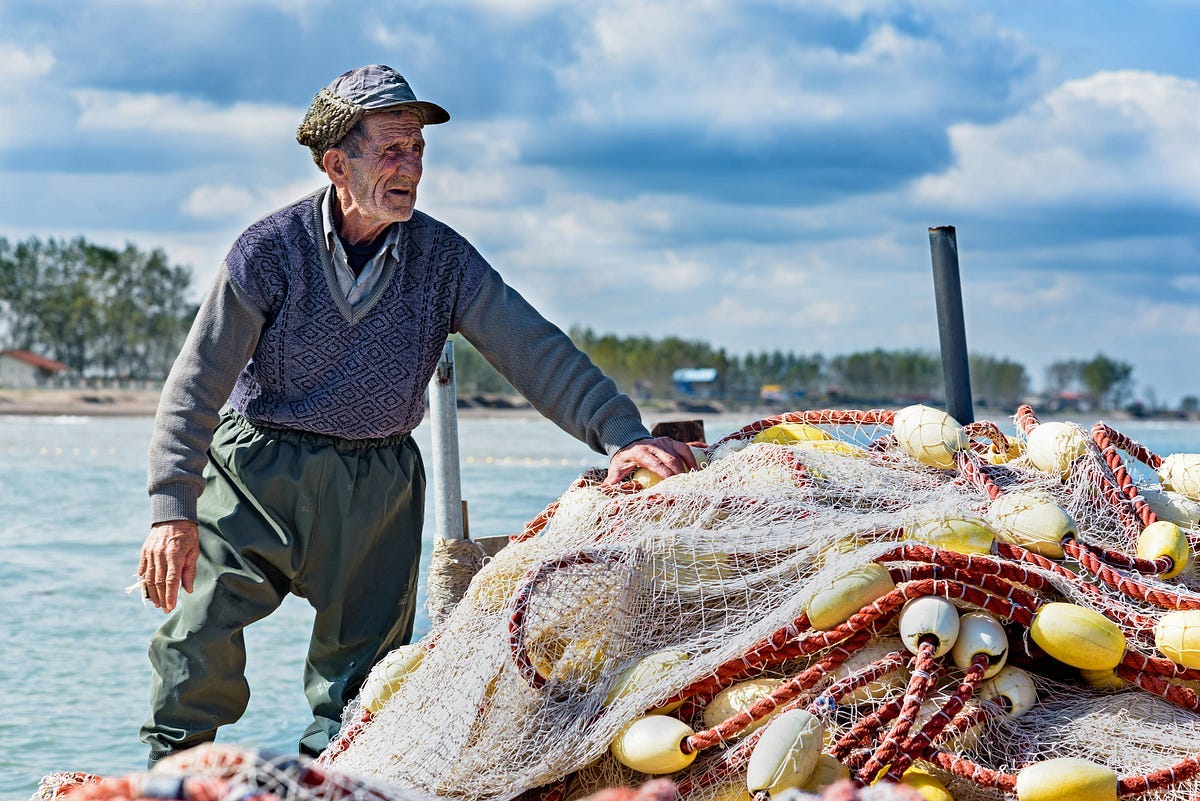 Fisherman with his catch of fish