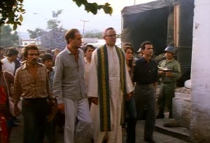 Romero leads the procession into the church at Aguilares