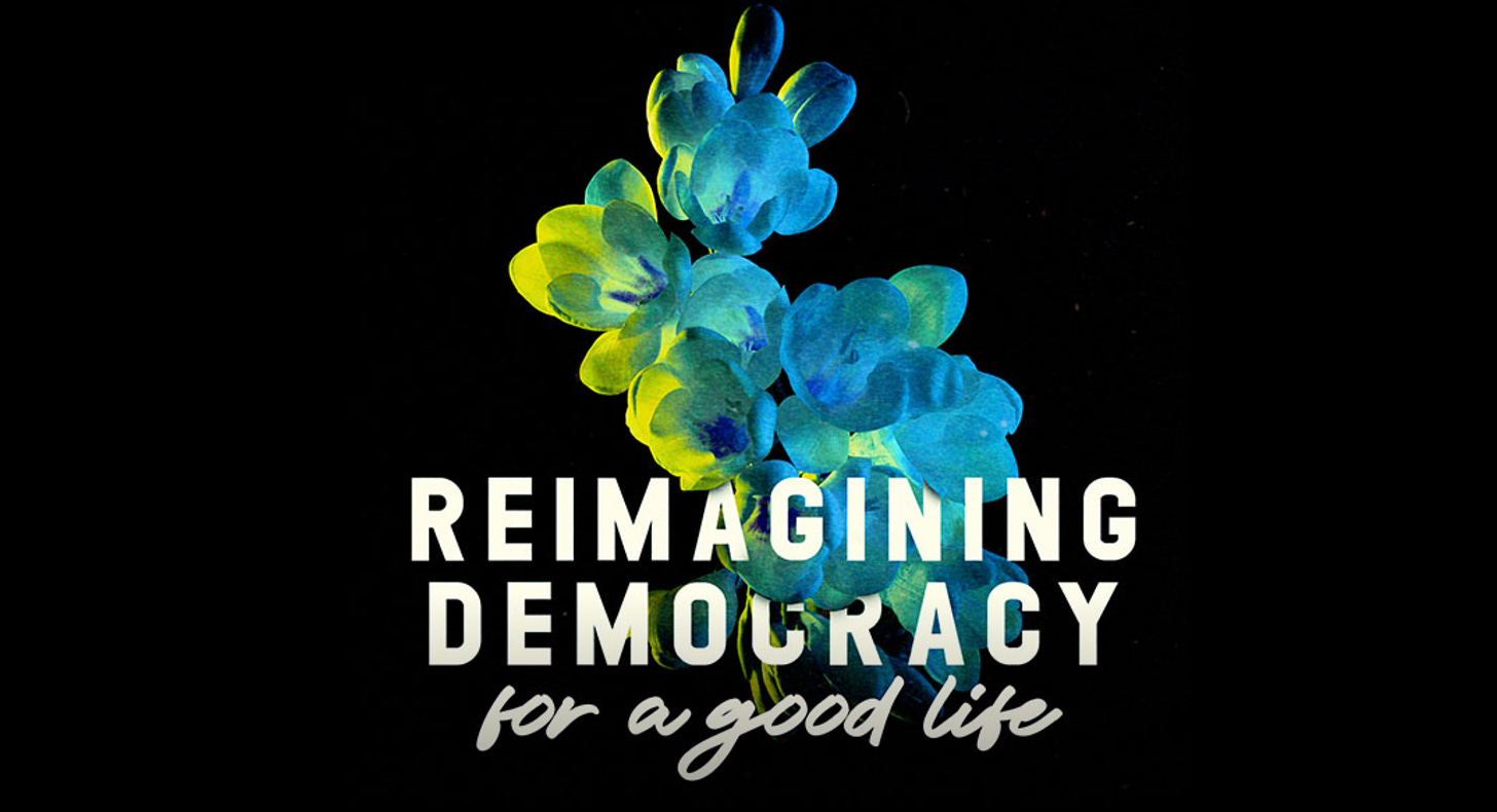 Album art primarily black space. in center is illuminated floral pattern of green, yellow, and blue emerging from centered title text at bottom which says REIMAGINING DEMOCRACY for a good life