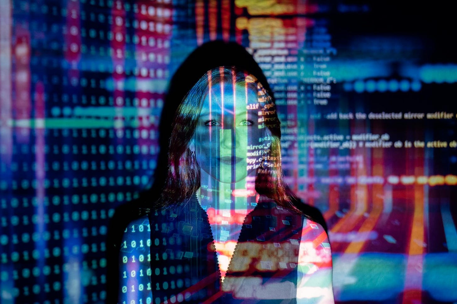 code projected over woman displaying quality of information.