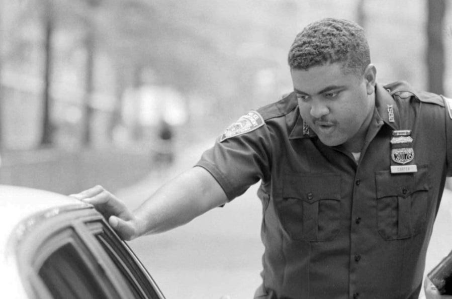 Race Hustle Rally Shame: Hanks’ Cop-Hating Ally Malcolm Penn Hijacks Hero Officer Carter’s Name for Political Gain