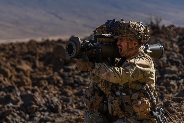 A U.S. Army Soldier with Alpha Company, 2nd Battalion, 35th Infantry Regiment, 3rd Infantry Brigade Combat Team, 25th Infantry Division, yells as he dry fires a Carl Gustaf 8.4 cm recoilless rifle, Nov. 7, 2023, at Pohakuloa Training Area, Hawaii.