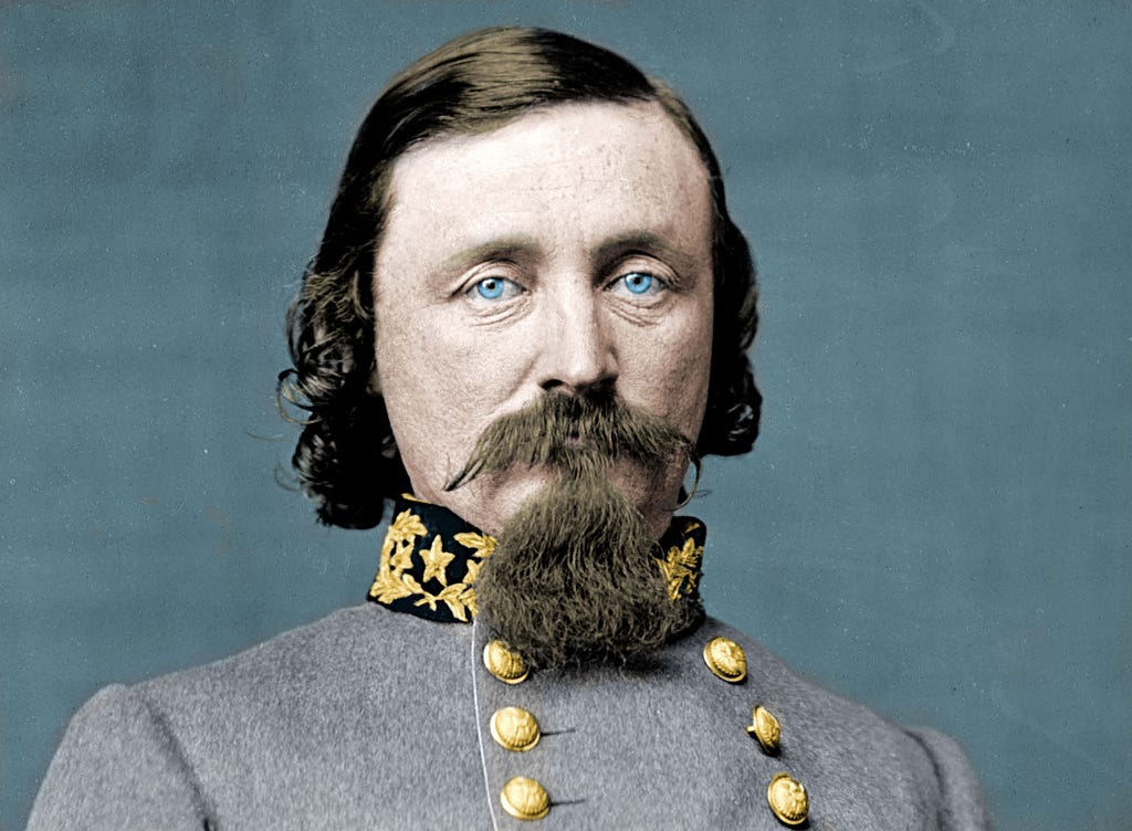 Picture of George Pickett a blue-eyed man with mustache, long hair and goutee.