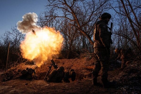 Ukrainians firing a mortar toward Russian positions near Bakhmut on Wednesday.