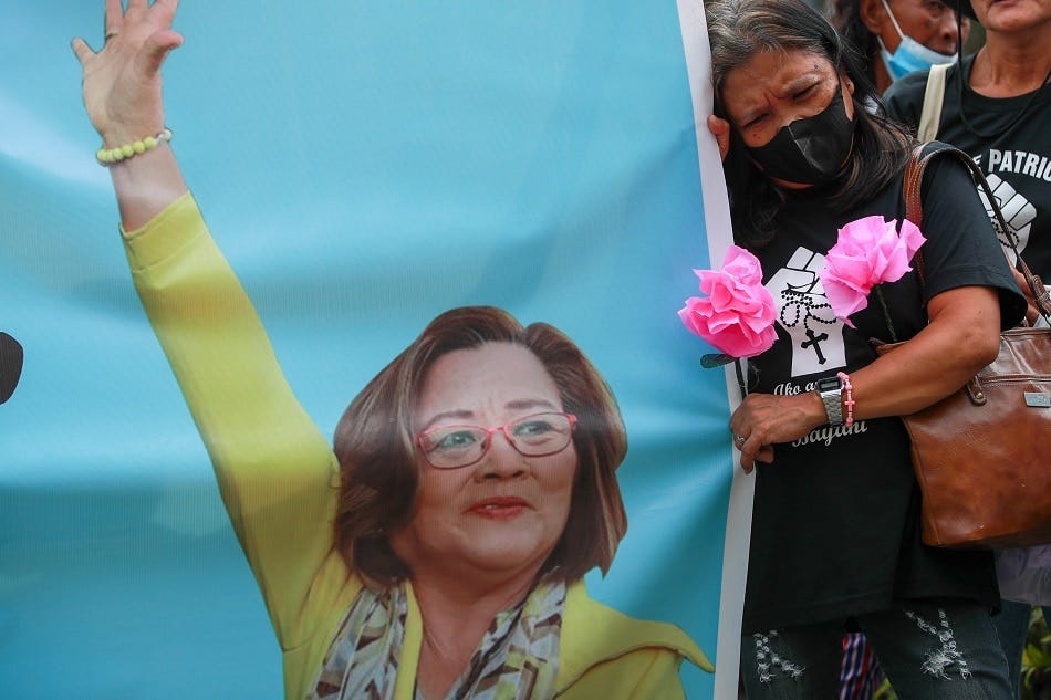 Supporters of former Senator Leila De Lima show their support for the embattled politician as she attends the promulgation on her drug case at the Muntinlupa RTC on May 12, 2023. Jonathan Cellona, ABS-CBN news/File