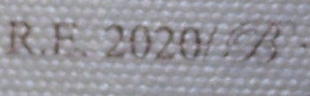Detalle del número de registro. La B es apenas legible con lupa.