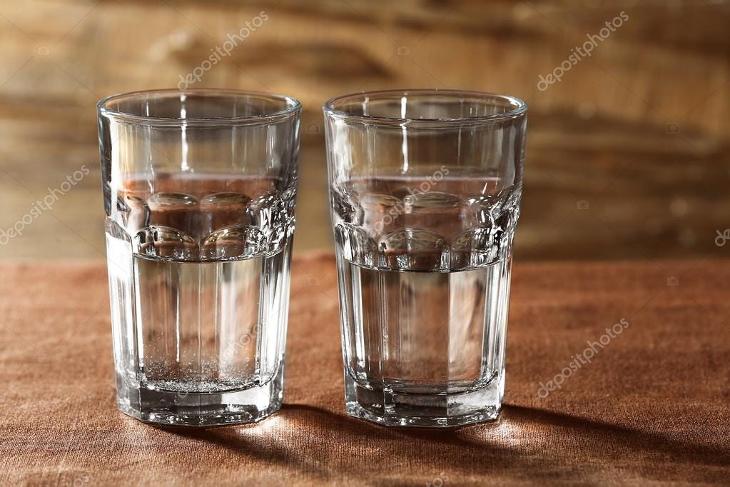 Two glasses of water on table on wooden background Stock Photo by ...