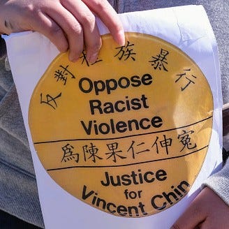 Demonstrator takes part in a rally to raise awareness of anti-Asian violence near Chinatown in Los Angeles, California.
