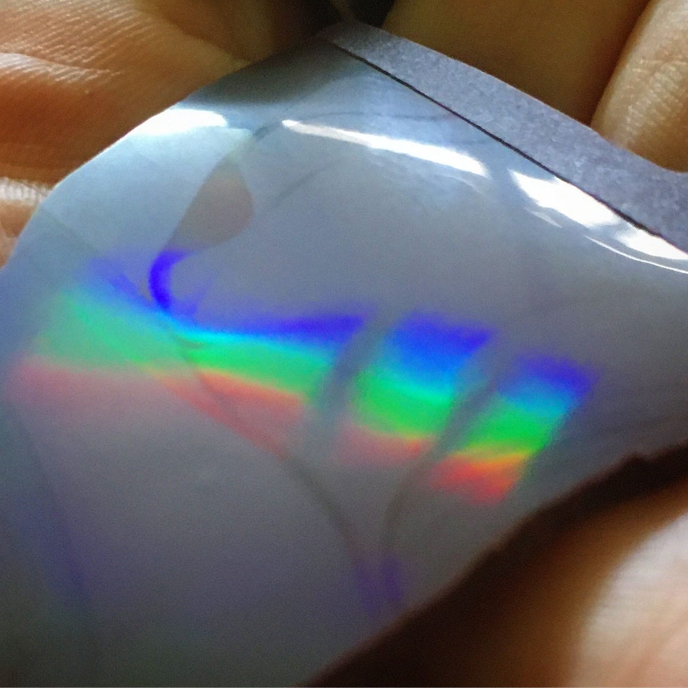 rainbow on chocolate from diffraction grating sheet