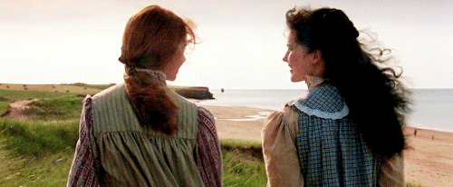 Anne and Diana look into sunset on PEI shore. 1980s version.