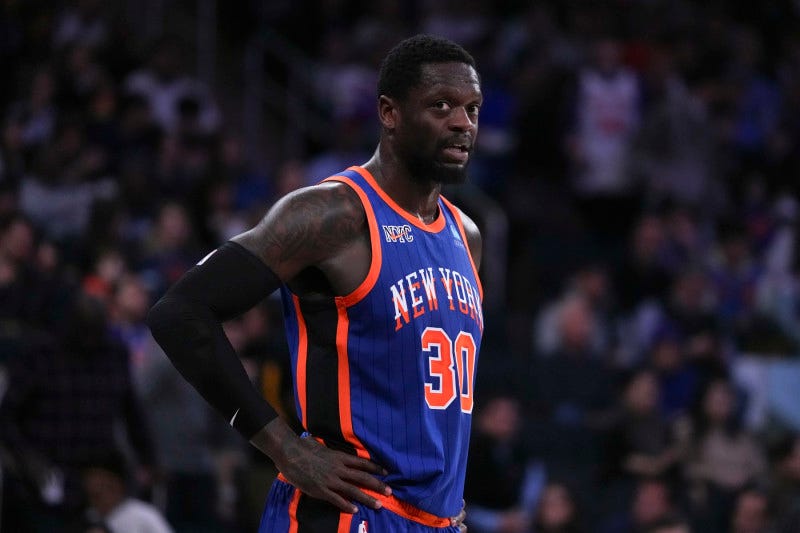 NEW YORK, NEW YORK - JANUARY 27: Julius Randle #30 of the New York Knicks looks on against the Miami Heat at Madison Square Garden on January 27, 2024 in New York City. NOTE TO USER: User expressly acknowledges and agrees that, by downloading and or using this photograph, User is consenting to the terms and conditions of the Getty Images License Agreement. (Photo by Mitchell Leff/Getty Images)
