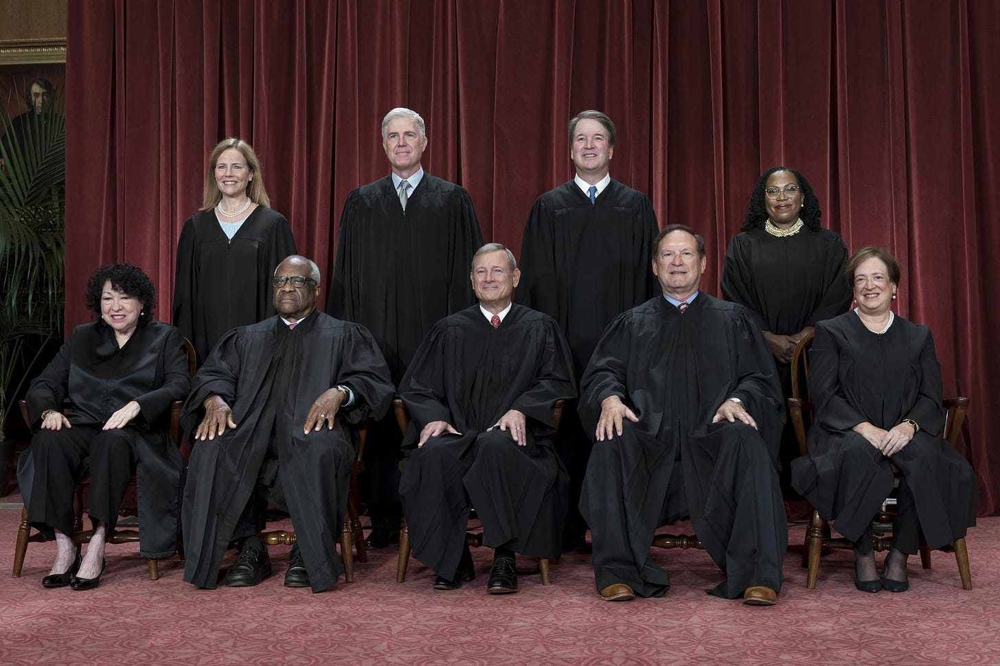 Members of the Supreme Court sit for a group portrait.