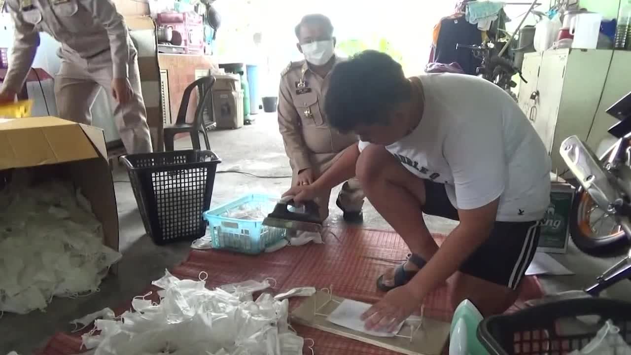 Factory caught RECYCLING used coronavirus face masks to sell again in  Thailand