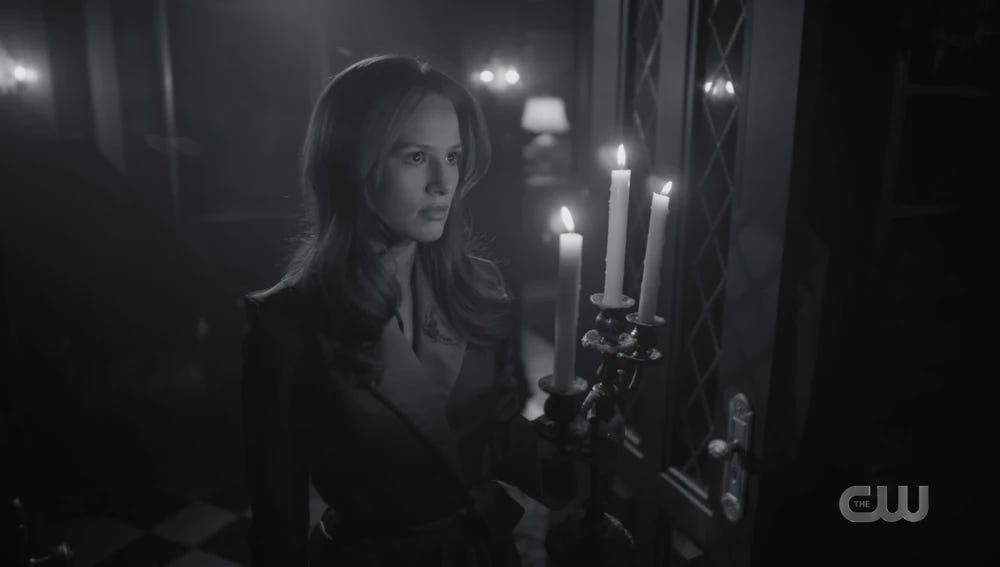 Cheryl holding candles.