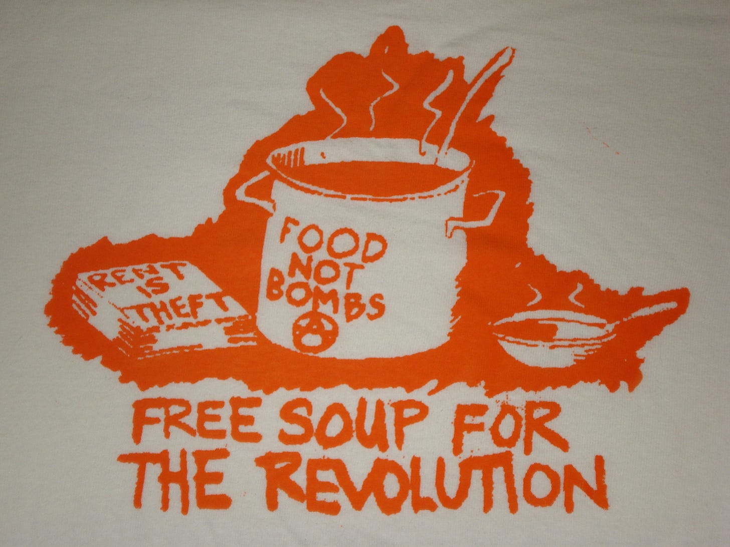 Soup pot that says "Food Not Bombs" next to book that says "Rent Is Theft." Caption says "Free soup for the revolution."