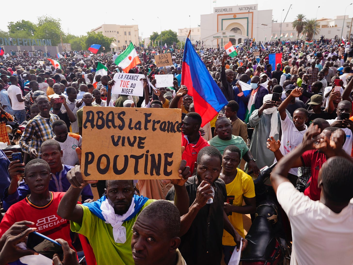 Supporters of Niger's coup march waving Russian flags and denouncing France  : NPR