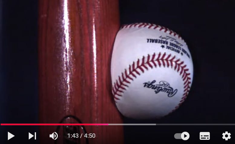 YouTube still of baseball warping on impact with a wooden bat