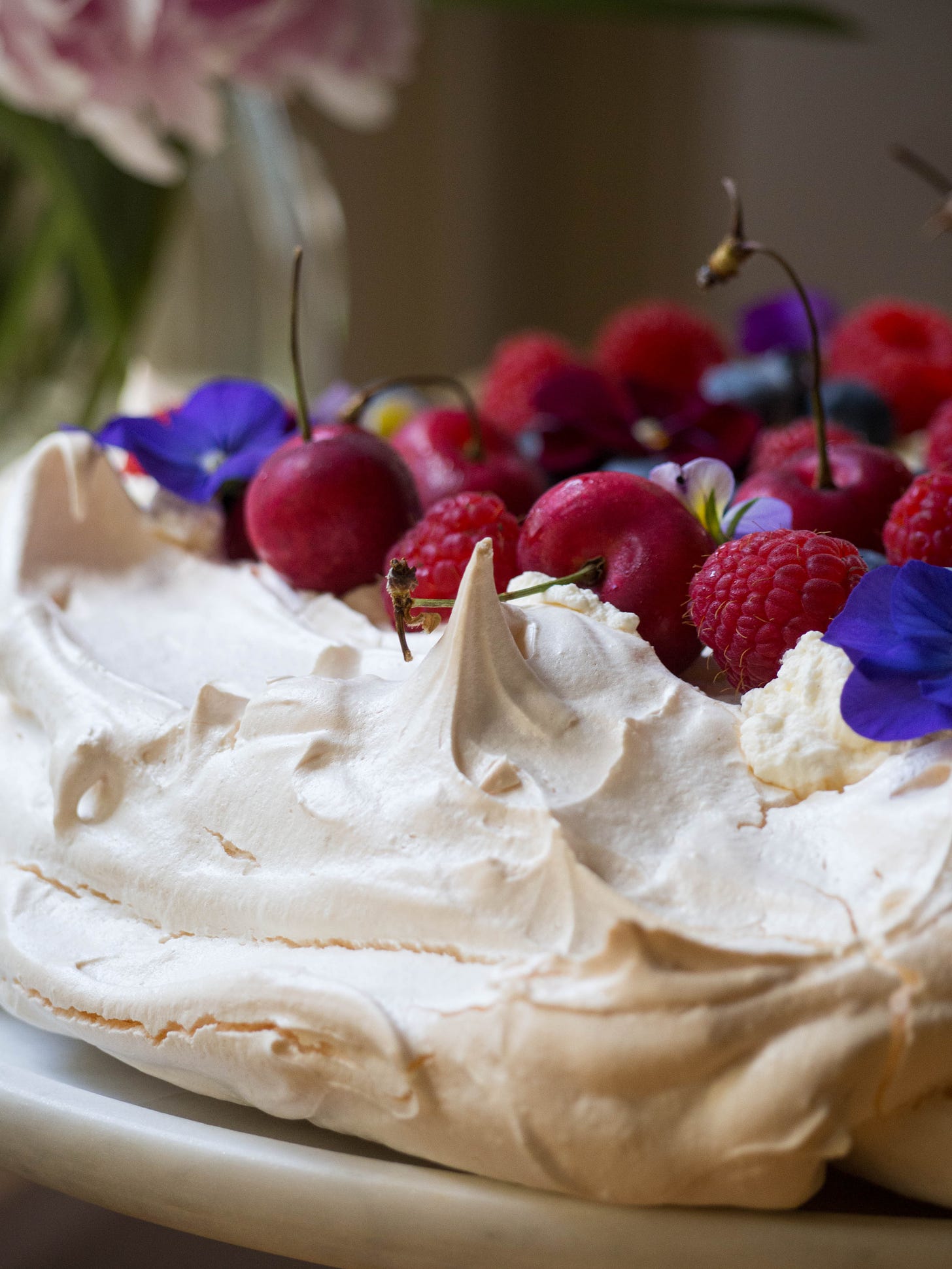 Pavlova with Berries, Cherries and Edible Flowers