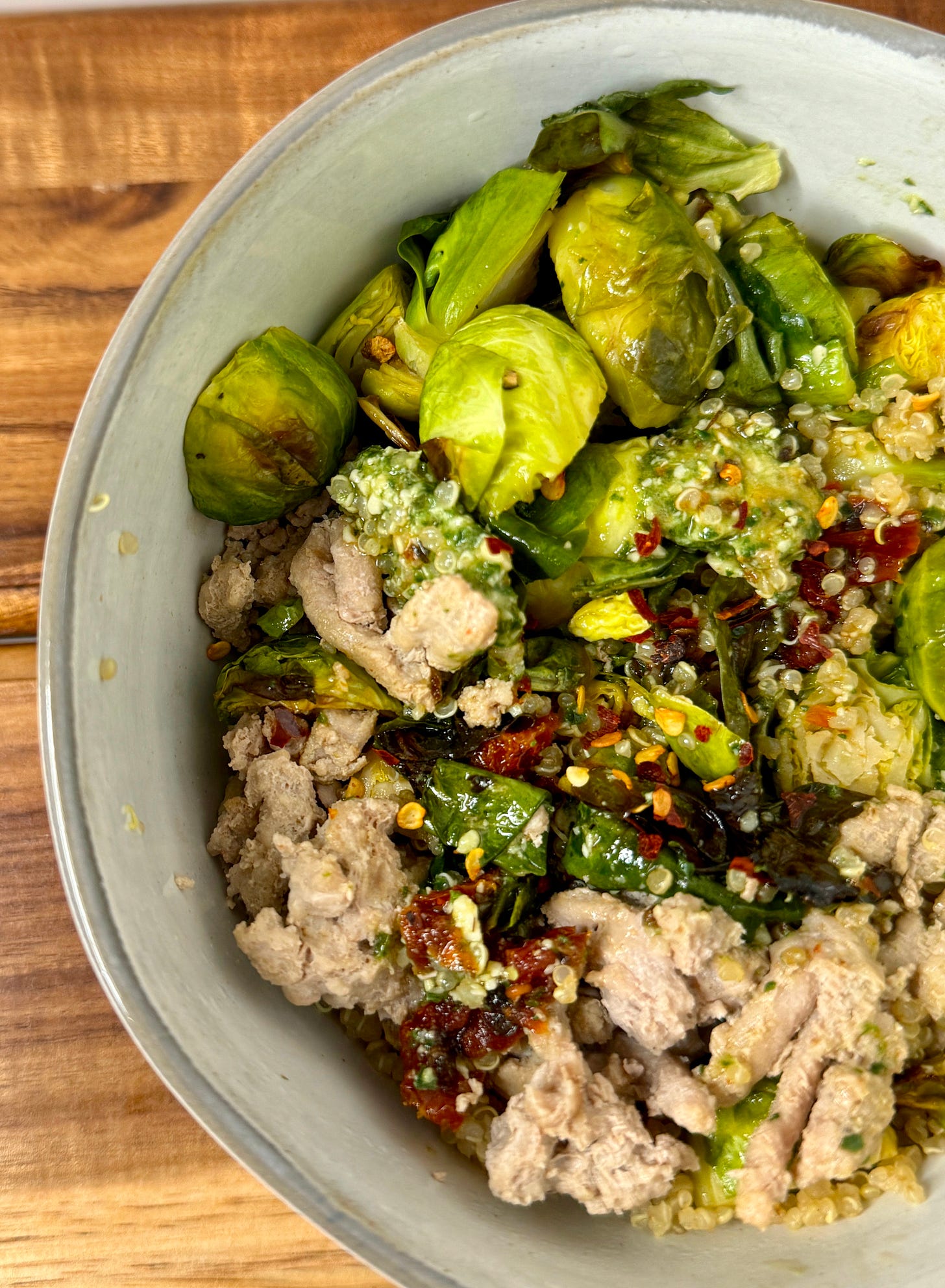 Pesto turkey quinoa bowl with brussels 