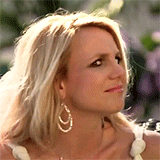 Gif of Britney Spears turning around with a very confused look on her face