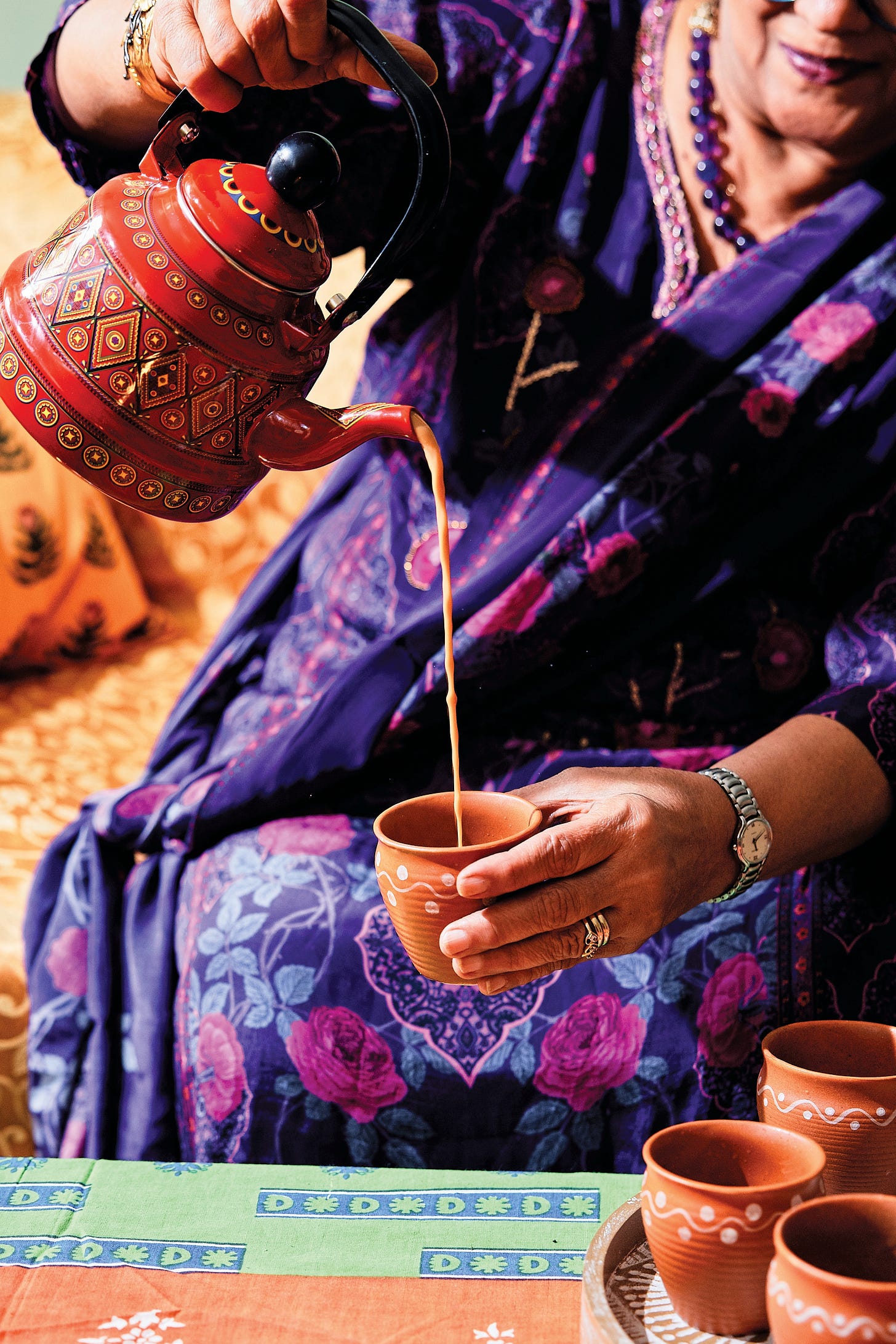 ID: Yamini Joshi pouring chai