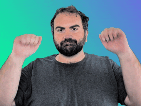 A man gives two thumbs up A man gives two thumbs up