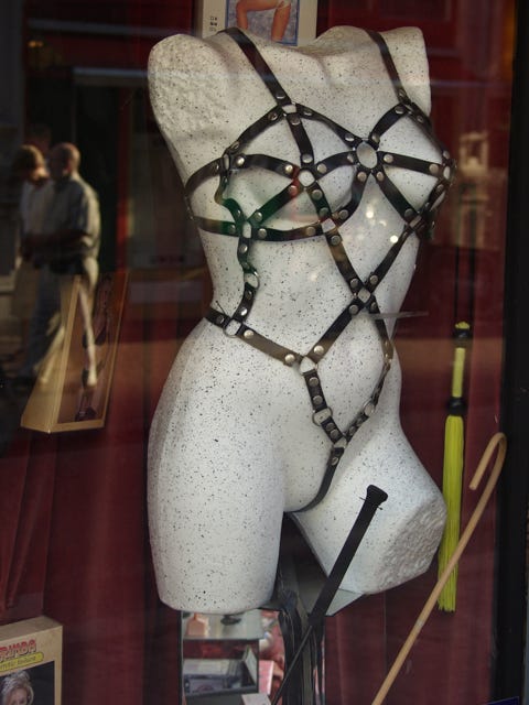 A mannequin in a shop window

Description automatically generated