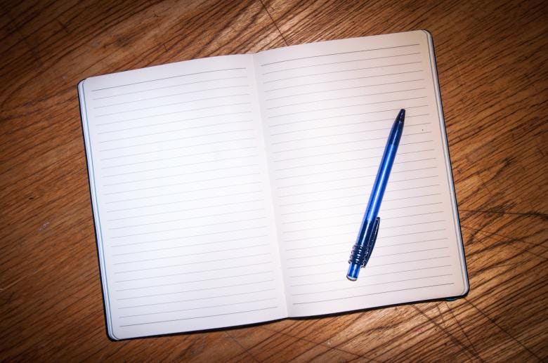 Free stock image of Notebook with pen on table created by Luka