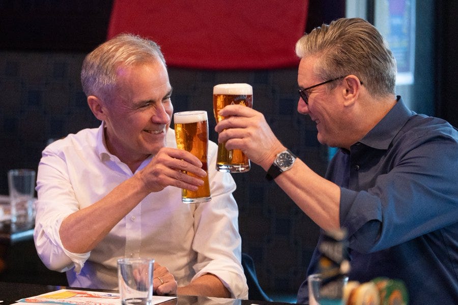 Prime Ministers Mark Carney and Keir Starmer cheers with a pint of beer at a pub in Ottawa, Ontario.