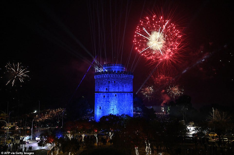 THESSALONIKI: Fireworks explode over Thermaikos gulf next to the White Tower in Thessaloniki, Central Macedonia, Greece, during the New Year's celebrations on January 1, 2025