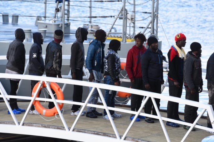 Rescued migrants disembark an AFM patrol boat: their arrival has ‘emergency’ written all over it, and delegitimises them from the get-go