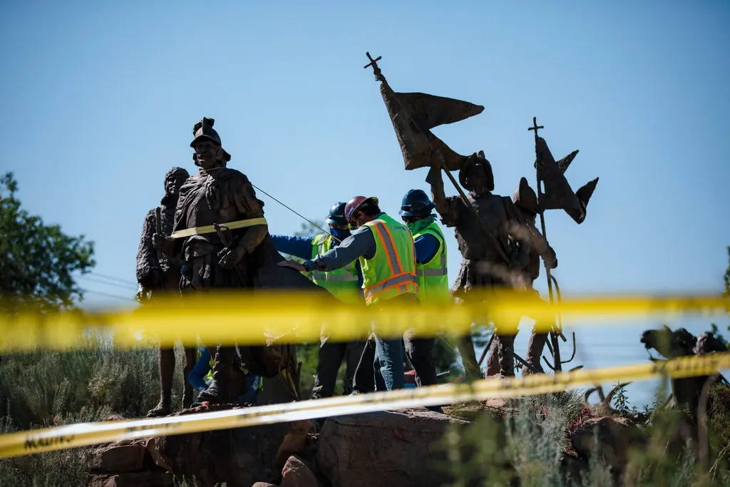 A crew removed the statue of Juan de Oñate from outside the Albuquerque Museum in Albuquerque on Tuesday.
