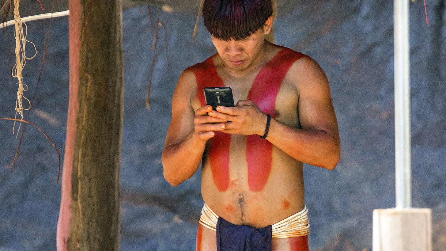 The jungle village hooked on their phones