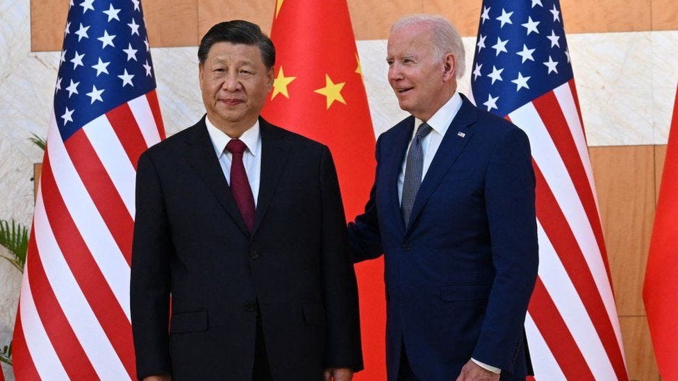 US President Joe Biden (R) and China's President Xi Jinping (L) meet on the sidelines of the G20 Summit in Indonesia
