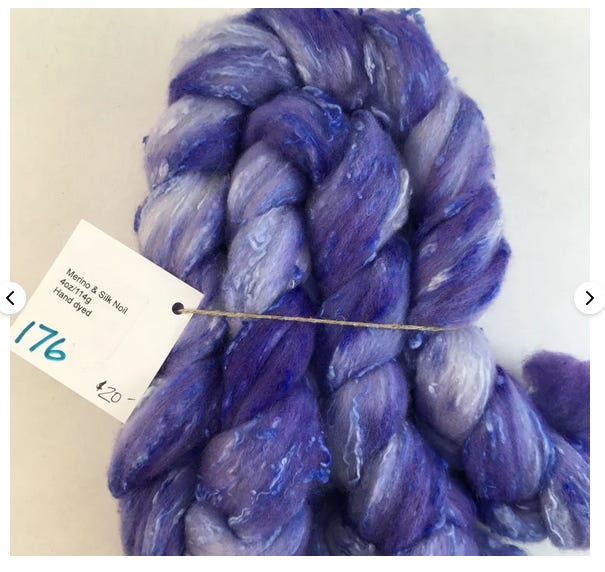 merino wool and silk noil blended together and dyes a range of purple blues